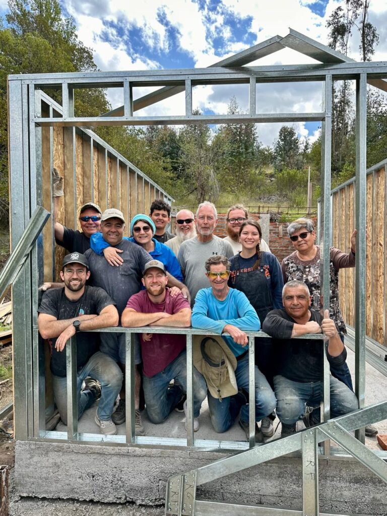 Volunteers inside the steel-framed structure
